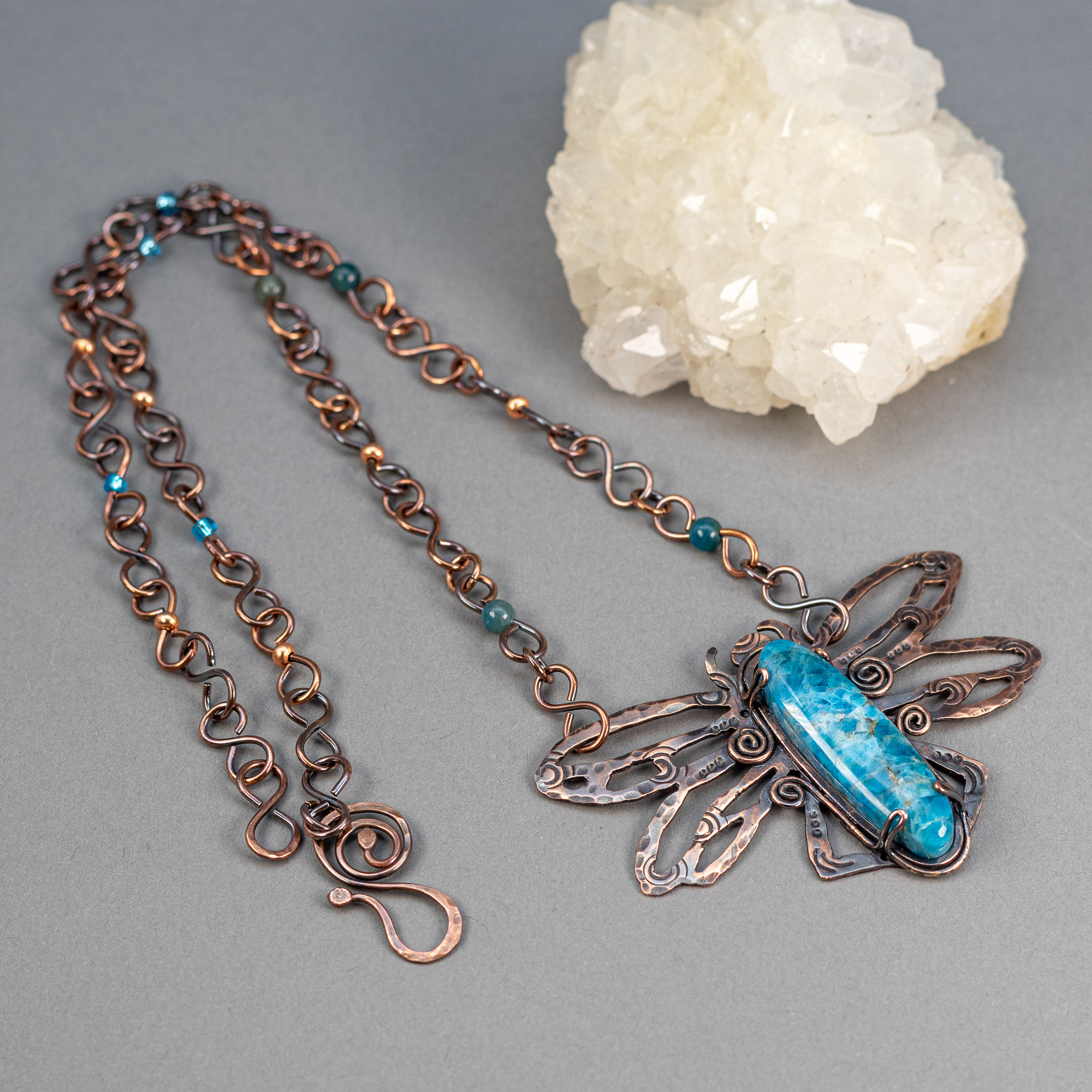 ""Handmade copper metal dragonfly pendant with blue green stone
