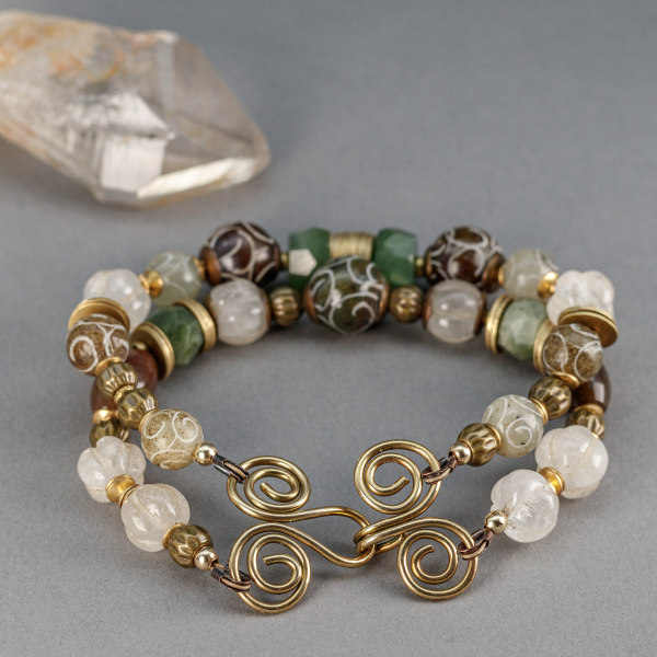 Handmade Brass Closure Complements the Pattern of the Carved Jade Beads