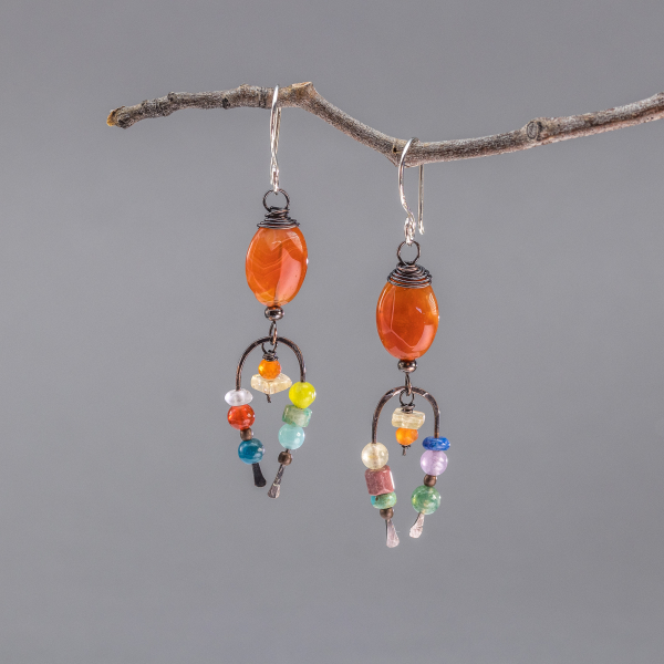 A pair of handcrafted whimsical art jewelry earrings