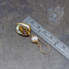 Golden Mother of Pearl Earrings are 2.125-inches long