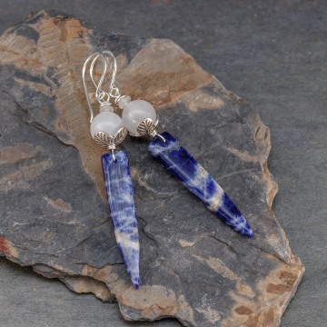 Earrings with long, skinny sodalite triangles topped with white quartz sphere.