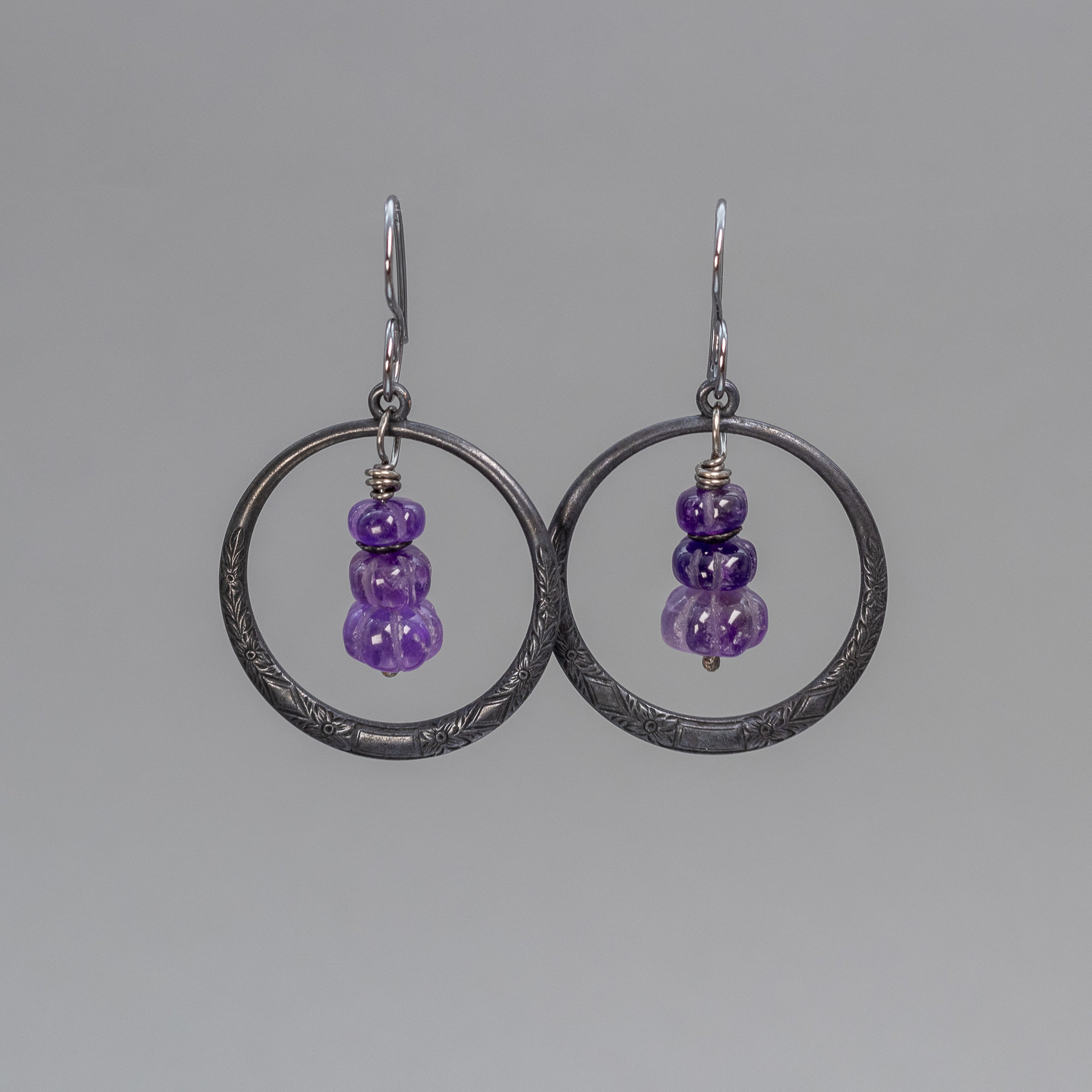 Black Brass Circle Earrings with Carved Amethyst Gemstones