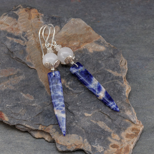 Earrings with long, skinny sodalite triangles topped with white quartz sphere.