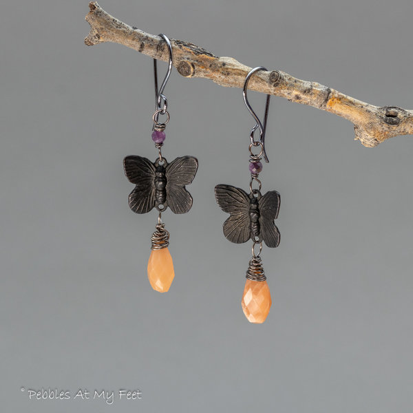 Peach Moonstone Dangle Earrings with Black Brass Butterflies and Purple Rubies